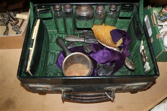 A cased silver dressing table set